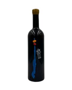 Bottiglia di vino nero Giorgio Mercandelli Archetijs Zianco 2019 con un'etichetta artistica che presenta una pennellata blu verticale con elementi arancioni e bianchi nella parte superiore, e la scritta stilizzata bianca "G/M" sopra "1/2" a destra.