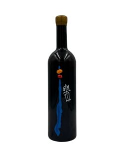 Bottiglia Archetijs Zianco 2019 con etichetta artistica: pennellata blu, dettagli arancioni e bianchi, G/M sopra 1/2.