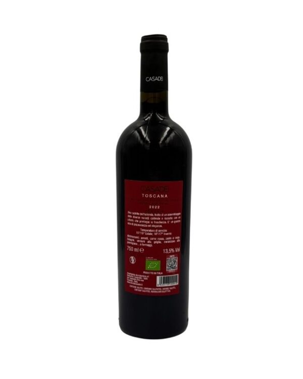 Retro della bottiglia di Casadei Armonia Toscana Rosso IGT Biologico 2022 con etichetta descrittiva che include il logo "C" di Casadei, il nome del produttore "CASADEI", la denominazione "TOSCANA Indicazione Geografica Tipica", l'annata "2022" e la menzione "BIOLOGICO". È presente un testo descrittivo in italiano sul vino, insieme alle certificazioni biologiche e al QR code del produttore.