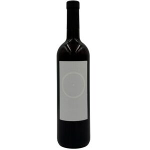 Bottiglia di Giorgio Mercadelli B Bianco Vino Bianco 2012 con un'etichetta bianca minimalista che presenta un cerchio con un punto al centro e la lettera "B" in grigio chiaro, con l'annata "2012" in basso.