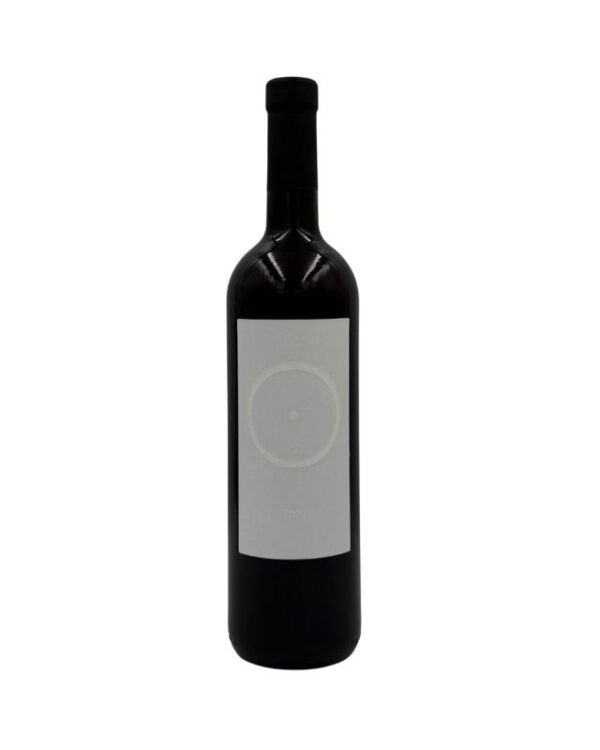 Bottiglia di Giorgio Mercadelli B Bianco Vino Bianco 2012 con un'etichetta bianca minimalista che presenta un cerchio con un punto al centro e la lettera "B" in grigio chiaro, con l'annata "2012" in basso.