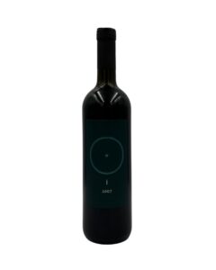 Bottiglia di Giorgio Mercadelli I Rosso Vino Rosso 2007 con un'etichetta verde scura minimalista che presenta un cerchio con un punto al centro, la lettera "i" e l'annata "2007".